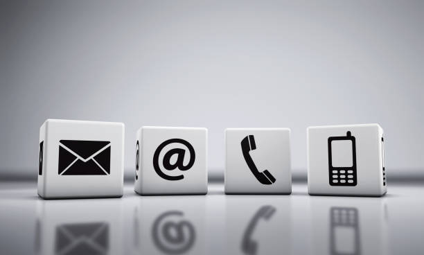 Website and Internet contact us icons on cubes with copy space 3D illustration.
